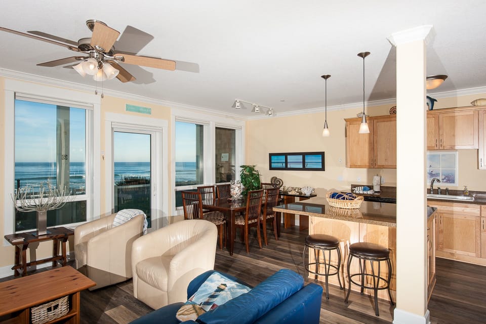 Condo, 2 Bedrooms, Ocean View, Beachfront | Living area | Flat-screen TV, DVD player