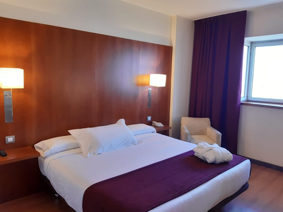 Select Comfort beds, minibar, in-room safe, desk