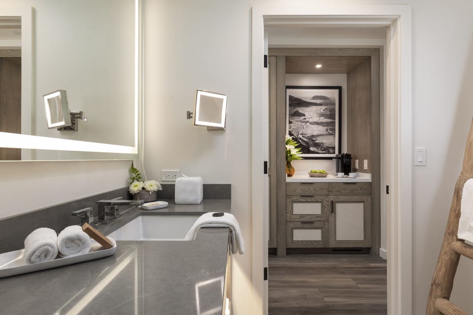 Designer toiletries, hair dryer, bathrobes, towels