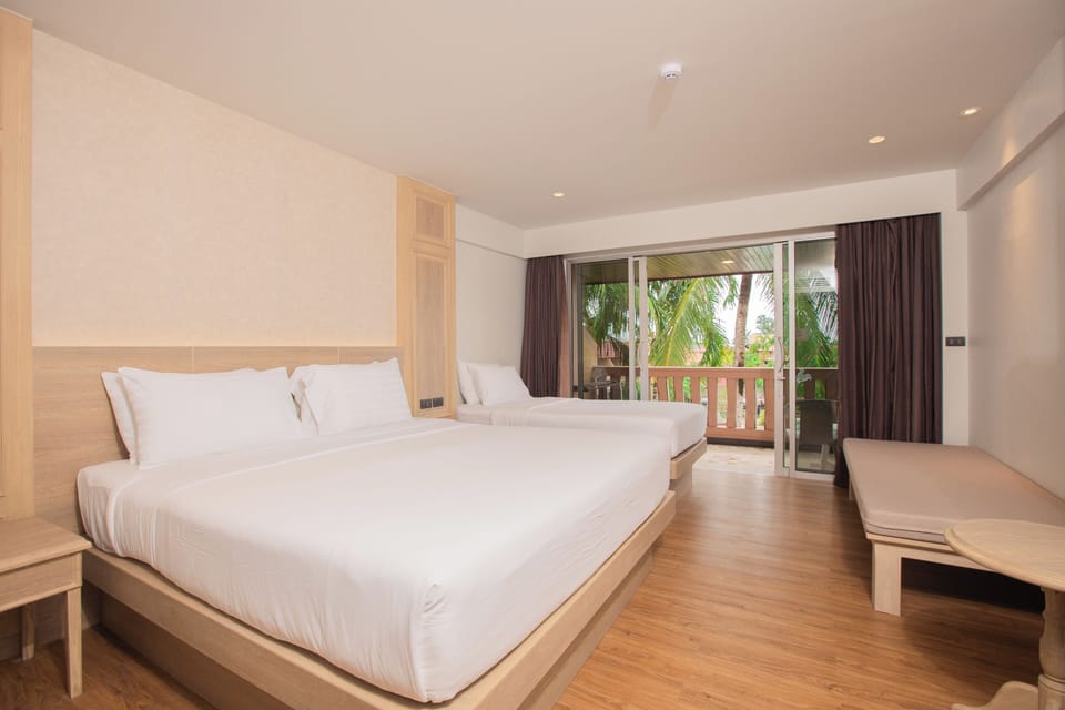 Family Room (Triple) | Minibar, in-room safe, desk, iron/ironing board