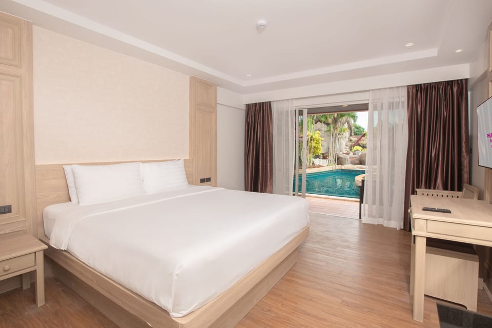 Room, Pool Access | Minibar, in-room safe, desk, iron/ironing board