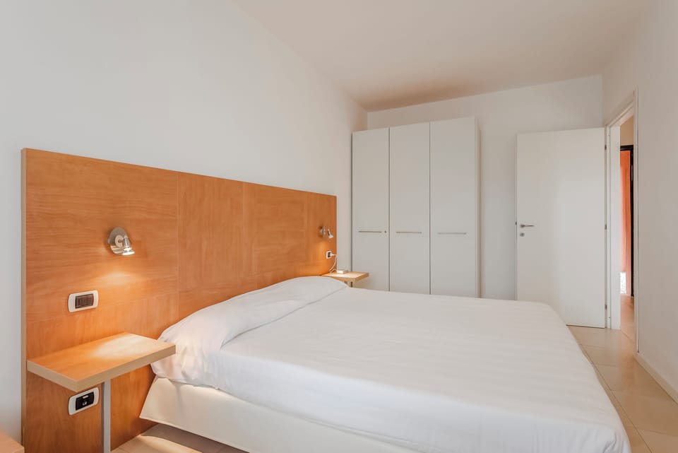 Down comforters, pillowtop beds, blackout drapes, free WiFi