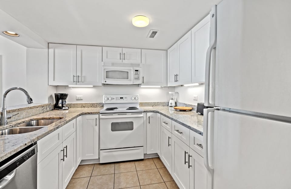 Condo, 2 Bedrooms, Beachfront | Private kitchen | Fridge, microwave, stovetop, dishwasher