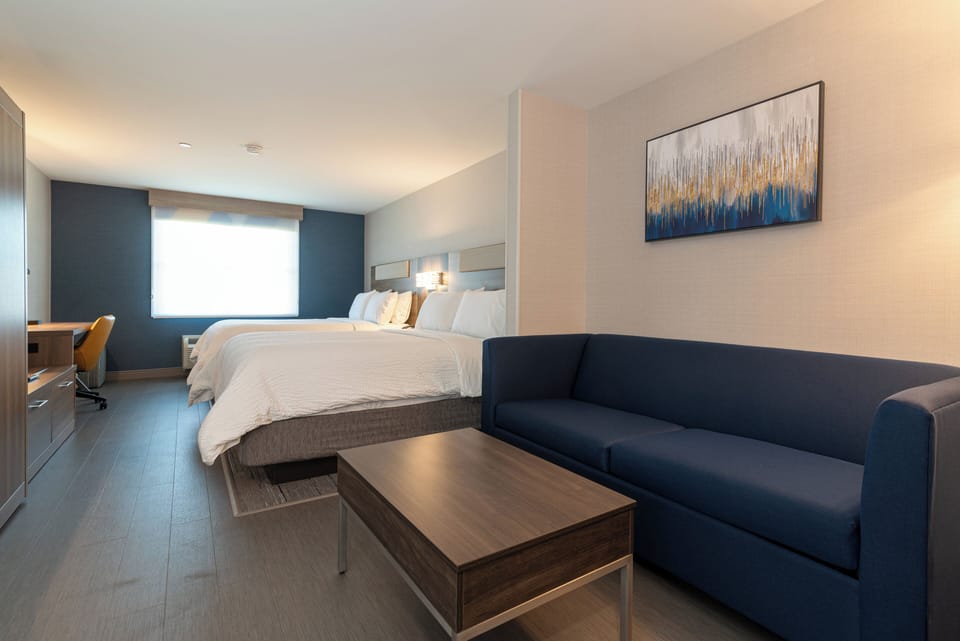 Suite, Multiple Beds | In-room safe, laptop workspace, soundproofing, iron/ironing board