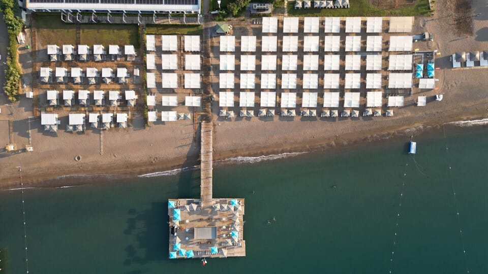 Private beach, sun loungers, beach umbrellas, beach volleyball
