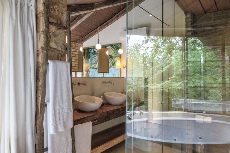 Design Suite, Private Pool, River View | Bathroom | Hair dryer, towels, soap, shampoo