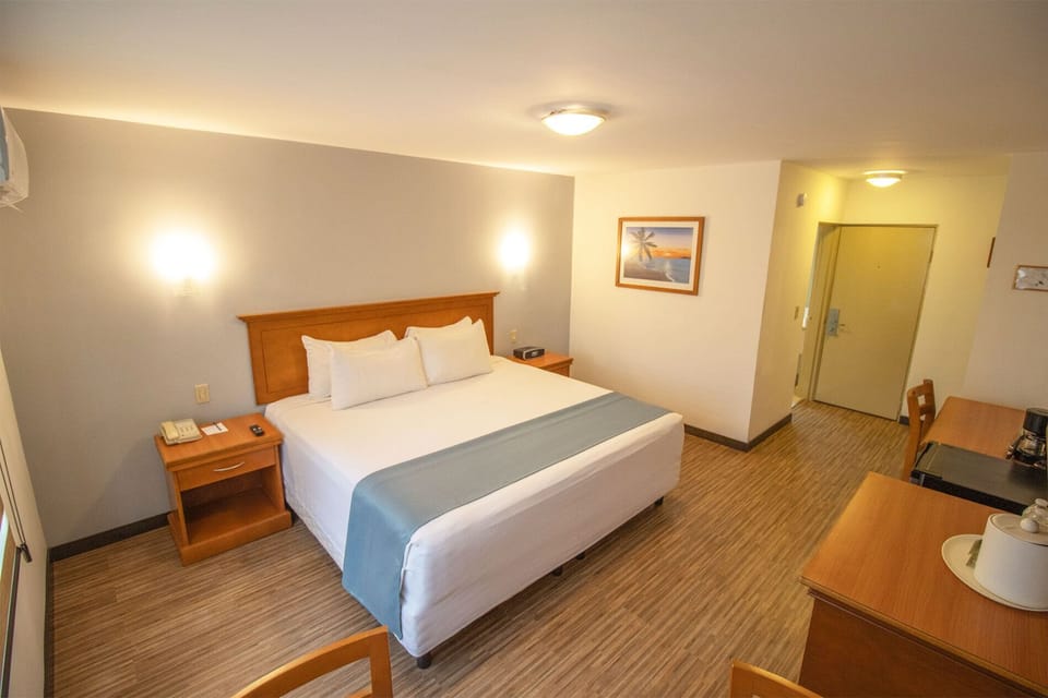 Standard Room, 1 Bedroom | Desk, laptop workspace, blackout drapes, soundproofing