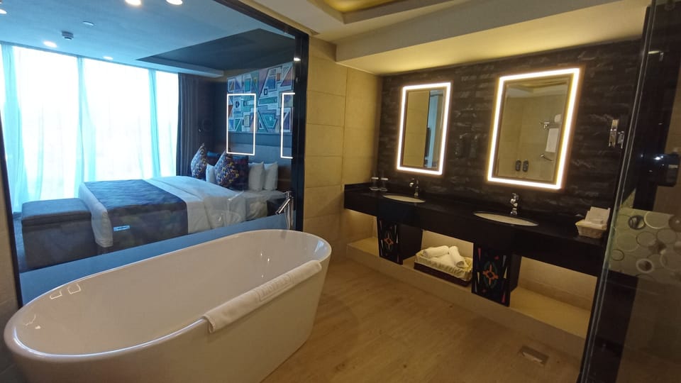Shower, rainfall showerhead, free toiletries, hair dryer