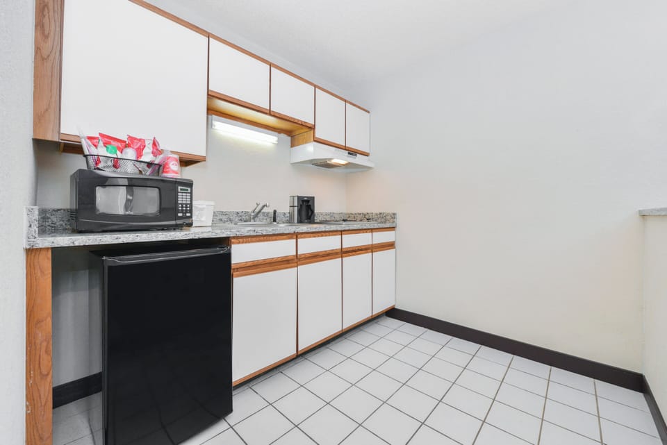 Desk, iron/ironing board, cribs (free), WiFi (free)