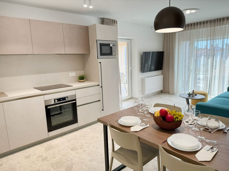 Superior Apartment, 1 Bedroom, Balcony, Sea View | Private kitchen | Fridge, electric kettle, cleaning supplies