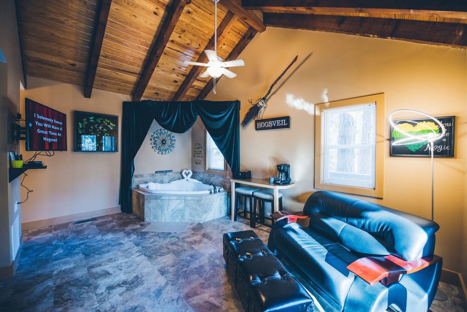 Deluxe Cottage, 1 King Bed, Jetted Tub | Living area | 43-inch flat-screen TV with cable/satellite channels, TV, DVD player