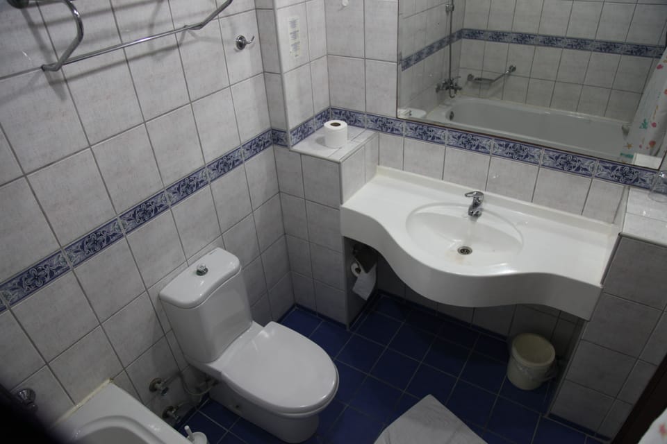 Bathtub, deep soaking tub, hair dryer, towels