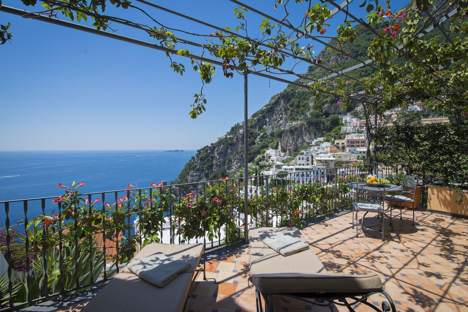 Suite, Terrace, Sea View | Minibar, in-room safe, desk, blackout drapes