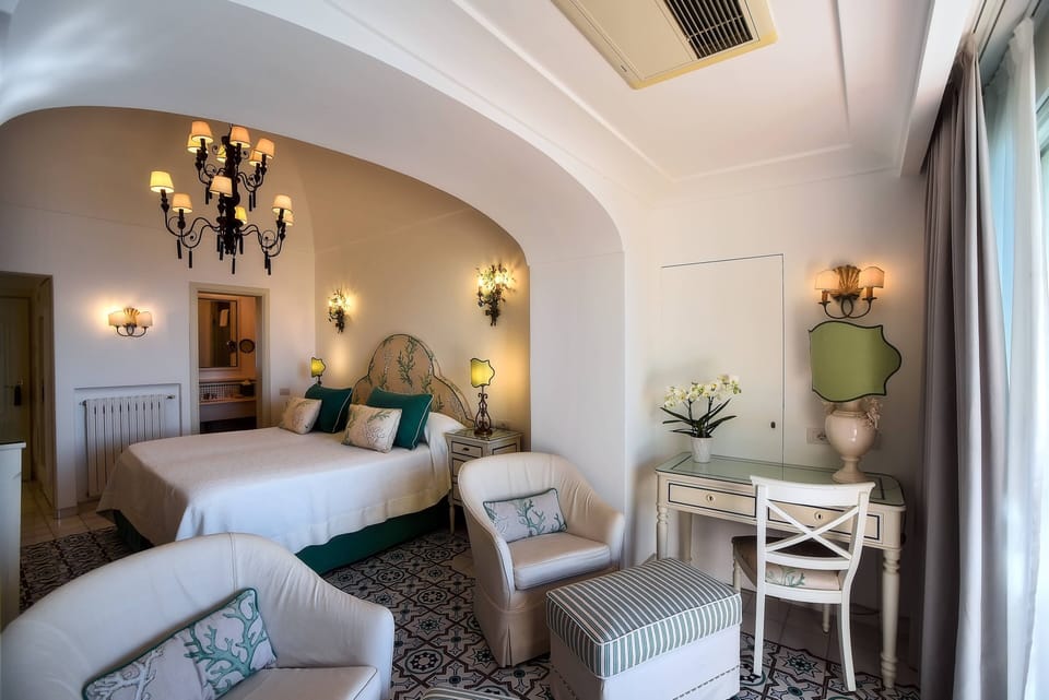 Superior Double Room, Balcony, Sea View | Minibar, in-room safe, individually decorated, individually furnished