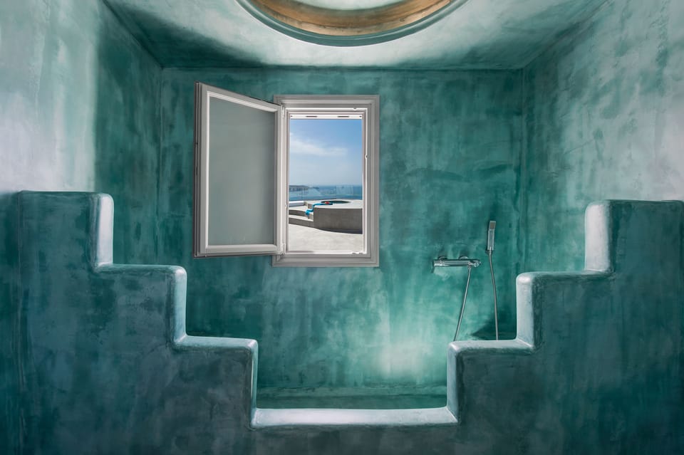 Honeymoon Suite outdoor Tub (Split level, Caldera View) | Bathroom | Shower, free toiletries, hair dryer, bathrobes