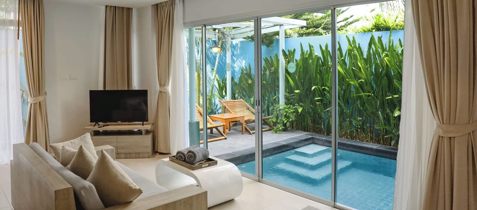 Duplex One Bedroom Pool Villa | Living room | 32-inch LCD TV with cable channels, TV