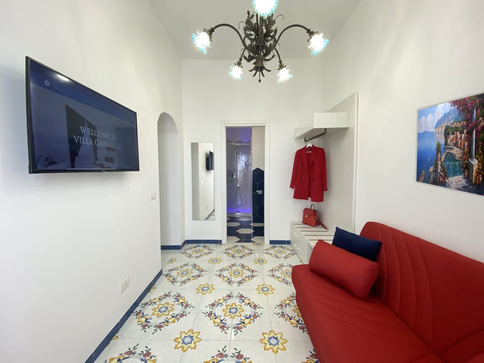 Family Double Room | Living area | Smart TV
