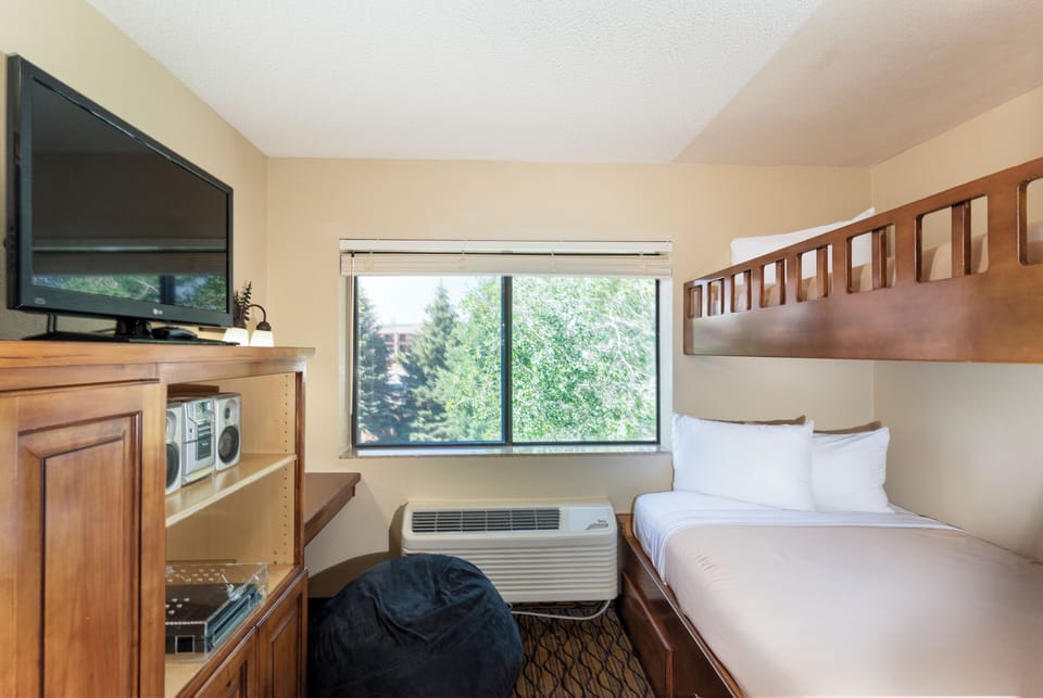 2 Bedroom Family Suite, 1 King and 1 Bunk (Twin over Double) | In-room safe, desk, laptop workspace, iron/ironing board