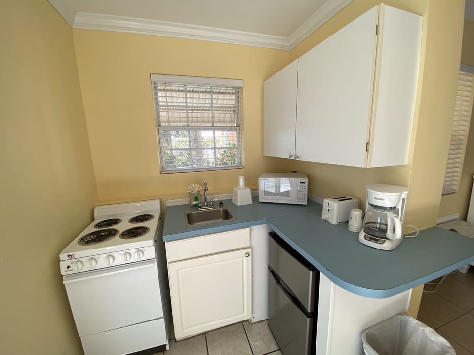North Cottage, 2 Double Beds, Ocean View | Private kitchen | Mini-fridge, microwave, coffee/tea maker, toaster