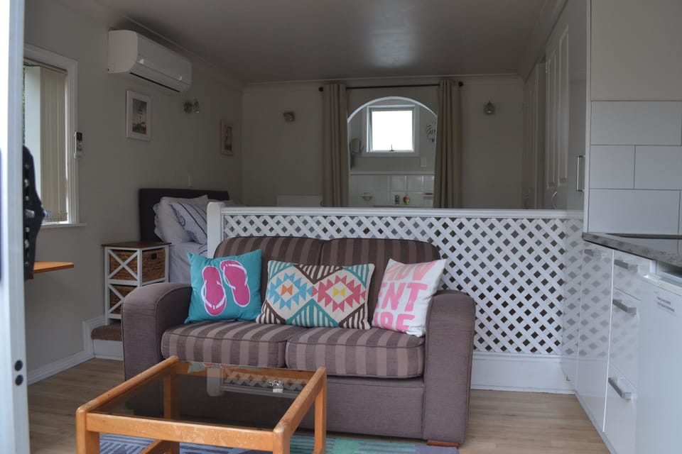 1-Bedroom Holiday Home | Living area | Flat-screen TV, DVD player