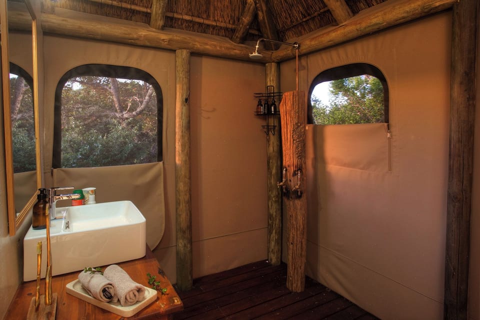 Classic Tent | Bathroom | Shower, rainfall showerhead, designer toiletries, hair dryer