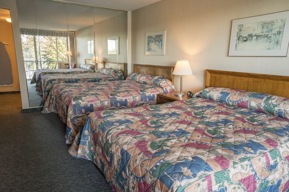 Room, 2 Queen Beds | Desk, iron/ironing board, cribs/infant beds, free WiFi