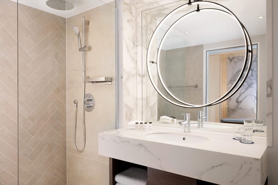 Shower, deep soaking tub, free toiletries, hair dryer