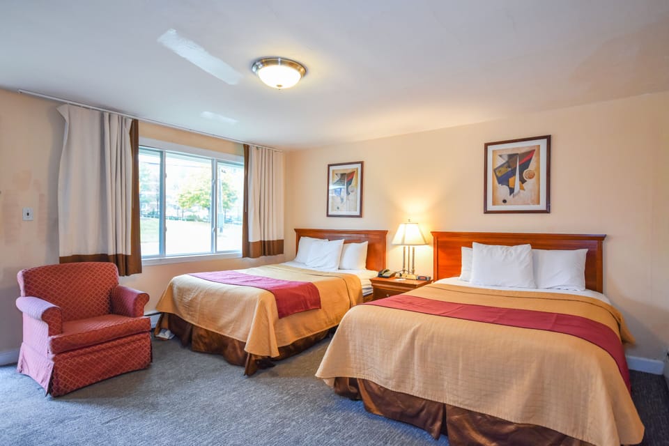 Standard Room, 2 Double Beds | Individually furnished, desk, laptop workspace, blackout drapes