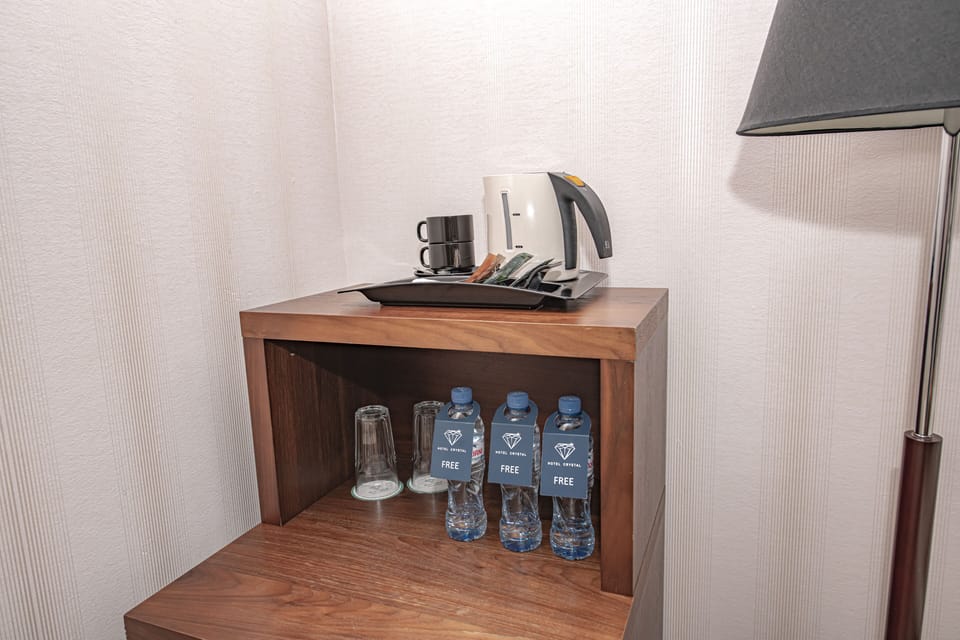 Family Room, 2 Bedrooms | Minibar, in-room safe, desk, iron/ironing board