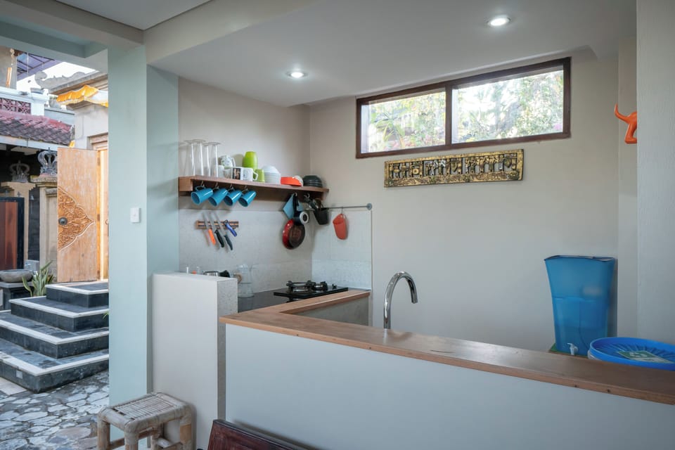 Mini-fridge, stovetop, electric kettle, toaster