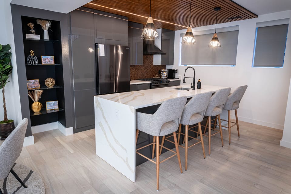 Luxury Townhome, 2 Bedrooms, Canal View | Private kitchen | Full-size fridge, microwave, oven, stovetop
