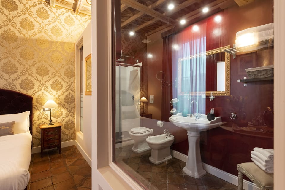 Deluxe Room, Balcony, City View | Bathroom | Shower, rainfall showerhead, designer toiletries, hair dryer
