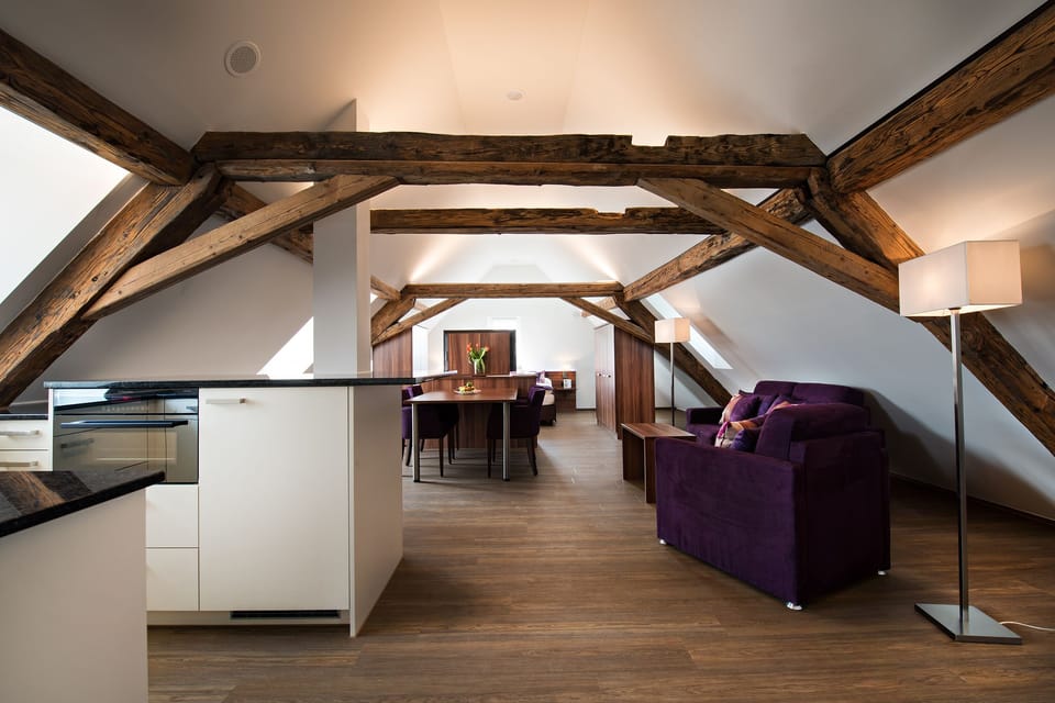 Panoramic Suite | Living area | Flat-screen TV