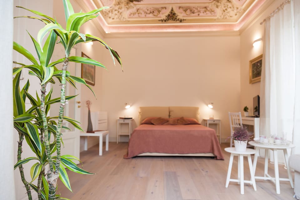 Suite | Premium bedding, down comforters, Select Comfort beds, in-room safe