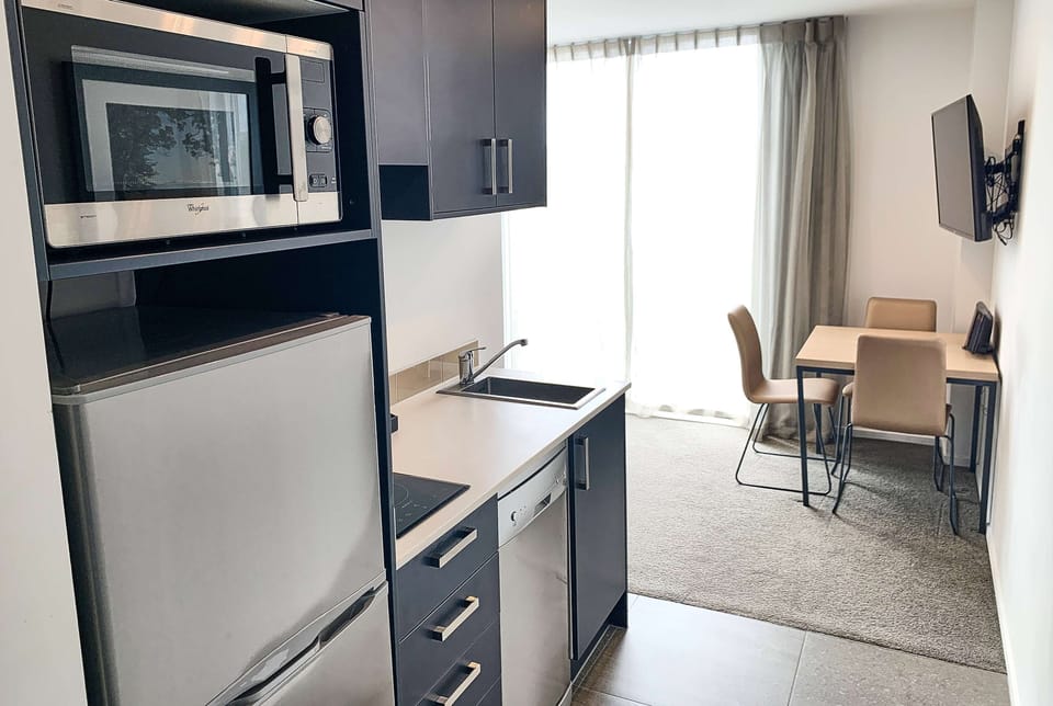 Premium bedding, laptop workspace, iron/ironing board, cribs/infant beds