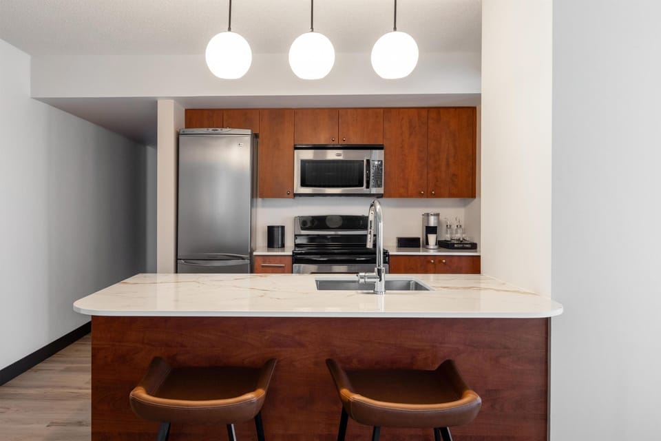 Presidential Suite, 2 Bedrooms | Private kitchen | Coffee/tea maker, full-size fridge, microwave, dishwasher