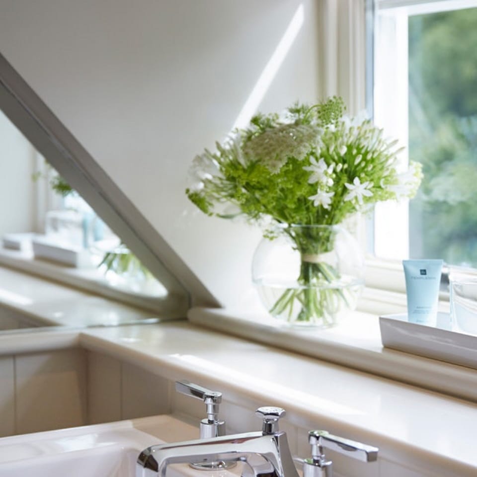 Designer toiletries, hair dryer, bathrobes, slippers