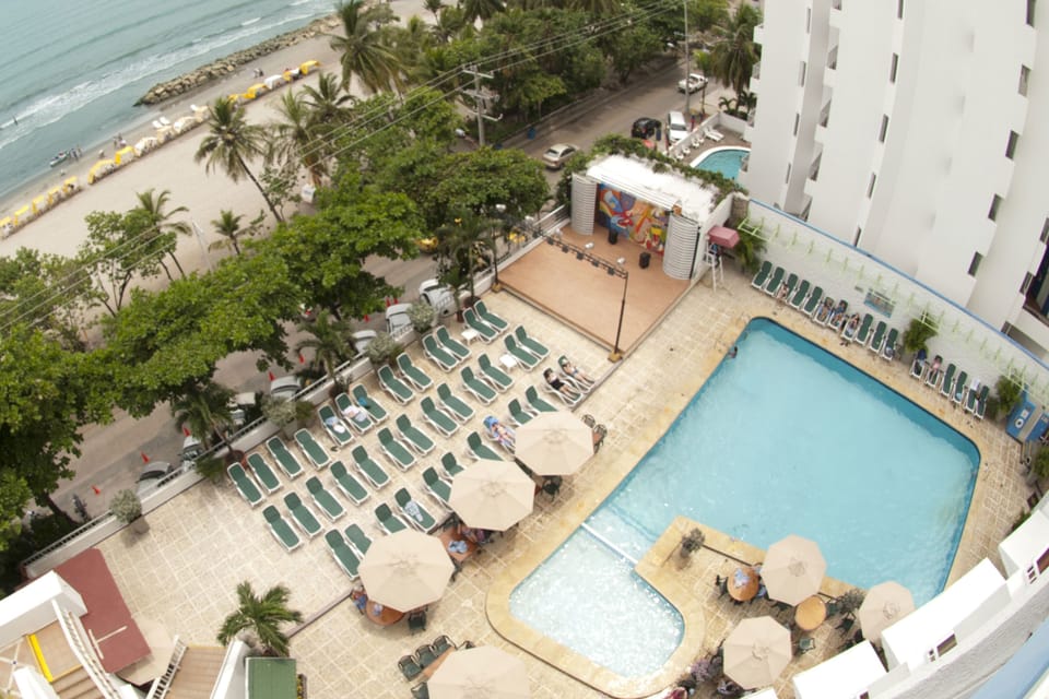Outdoor pool, open 9:00 AM to 8:00 PM, pool umbrellas, sun loungers