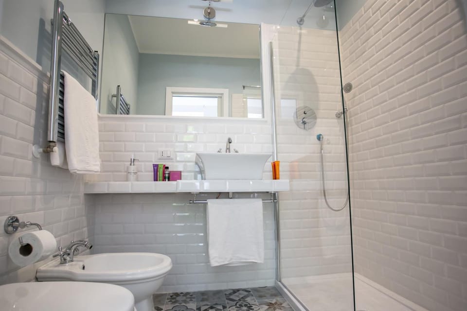 Shower, free toiletries, hair dryer, bathrobes