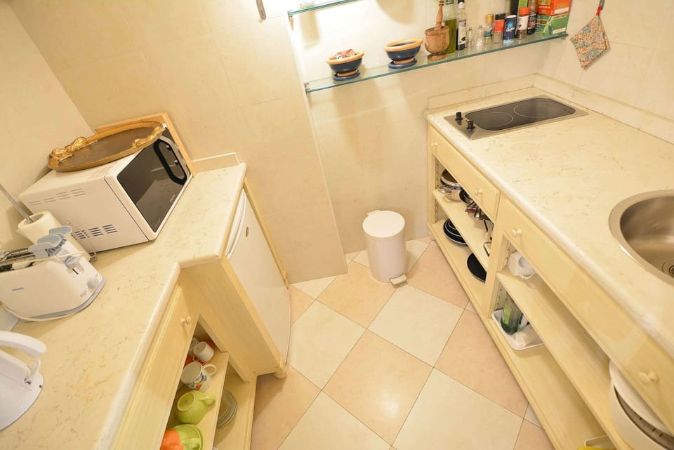 Apartment | Private kitchen | Fridge, stovetop, cookware/dishes/utensils