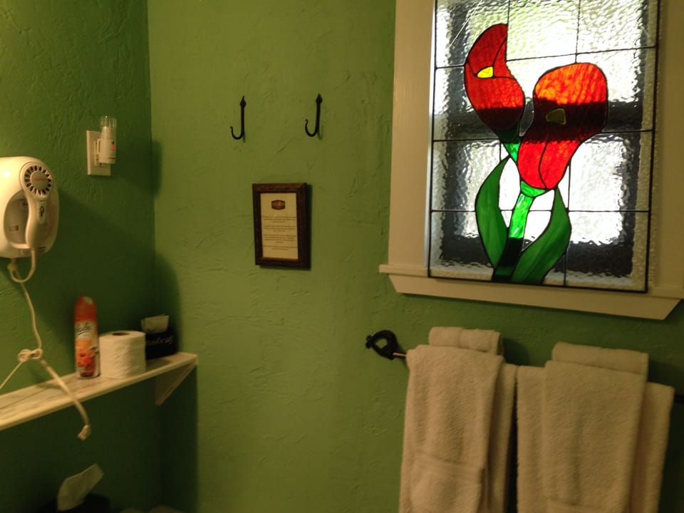 The Seagrape Room | Bathroom | Free toiletries, hair dryer, bathrobes, towels