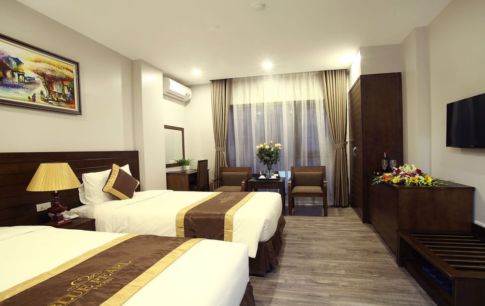 Deluxe Room | Minibar, in-room safe, desk, soundproofing