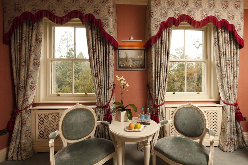 Luxury Double Room | Living area | Flat-screen TV, DVD player