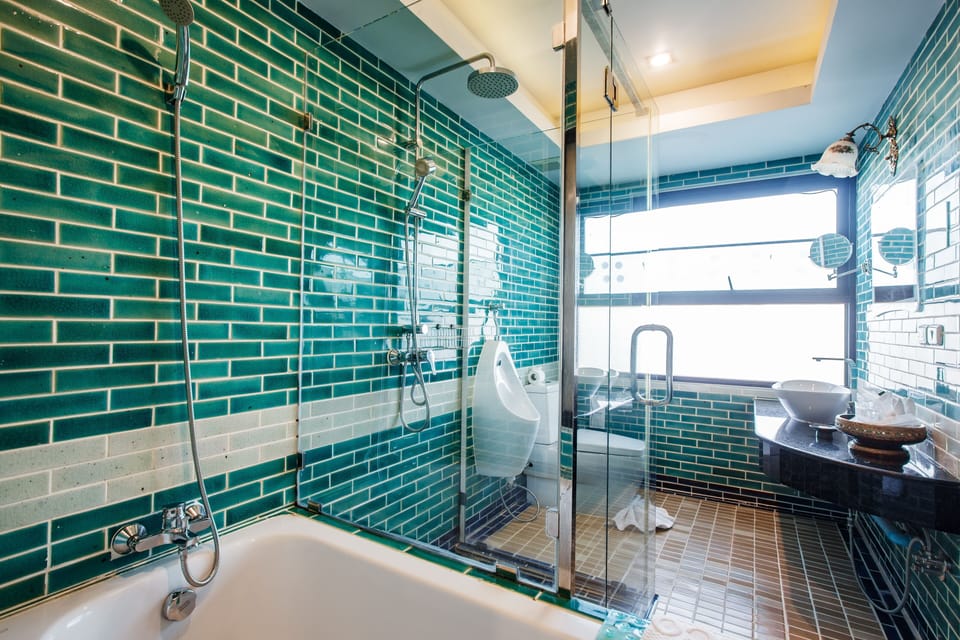 Shower, free toiletries, hair dryer, bathrobes