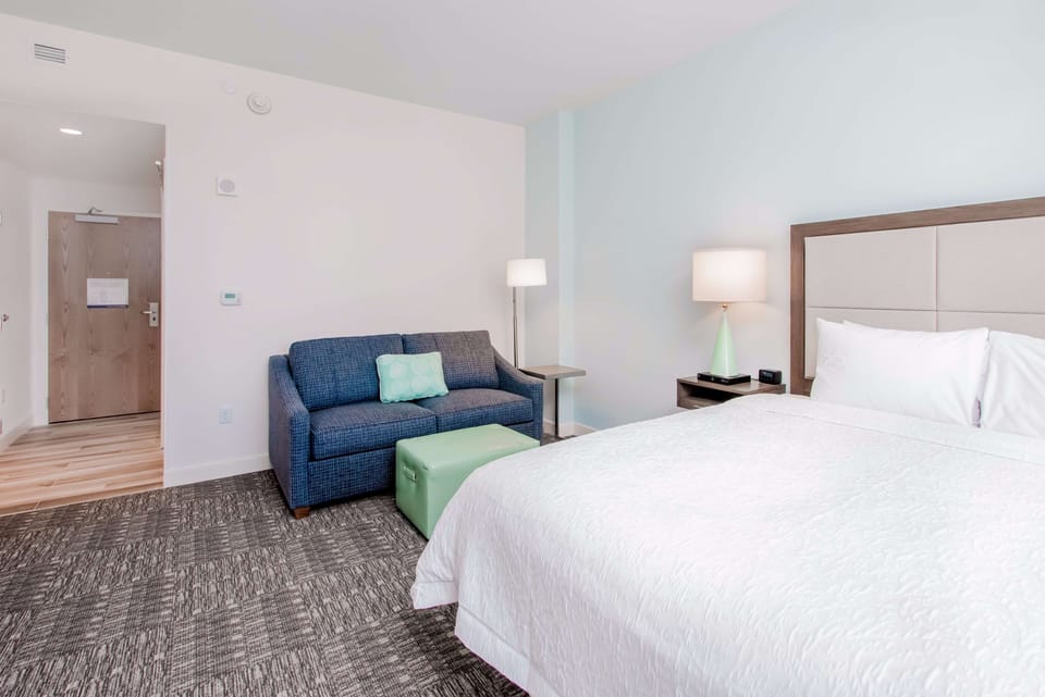Room, 1 King Bed with Sofa bed, Non Smoking, Balcony | Living area | LCD TV