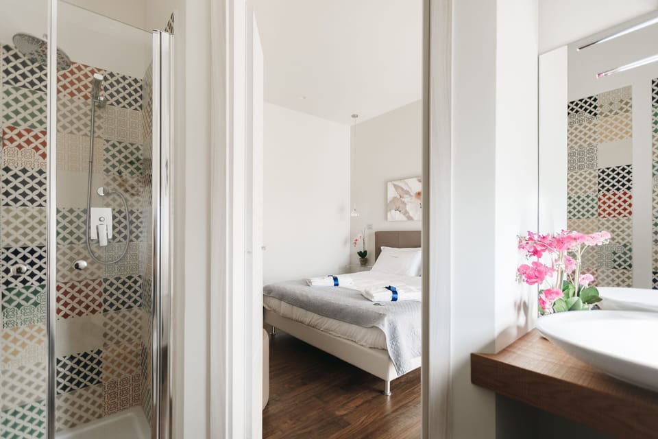 Deluxe Double Room, Balcony (Artemide) | Down comforters, minibar, in-room safe, individually decorated