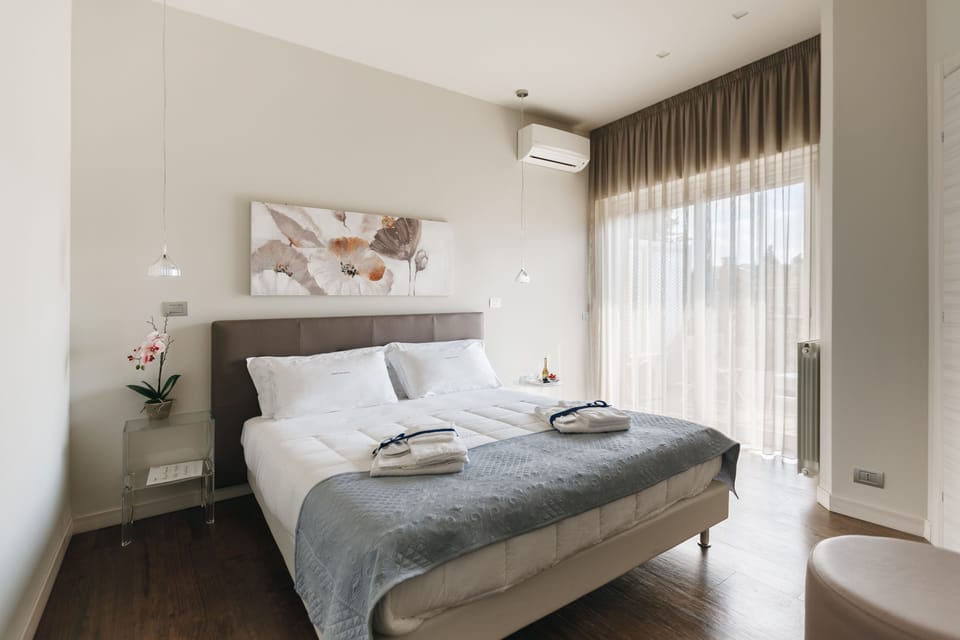 Deluxe Double Room, Balcony (Artemide) | Down comforters, minibar, in-room safe, individually decorated