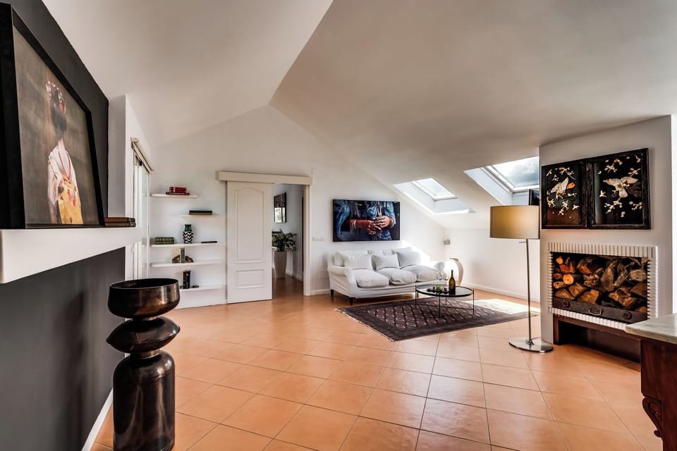 Suite Atico | Minibar, in-room safe, individually decorated, individually furnished