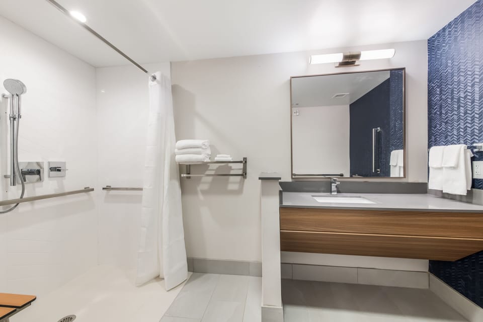 Shower, free toiletries, hair dryer, towels