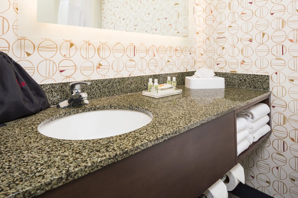 Combined shower/tub, eco-friendly toiletries, hair dryer, towels